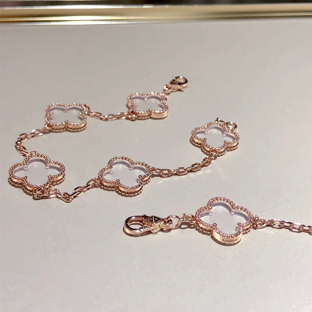[Bijoux de luxe] Bracelet en or rose avec cristaux de roche et 5 motifs de trèfle