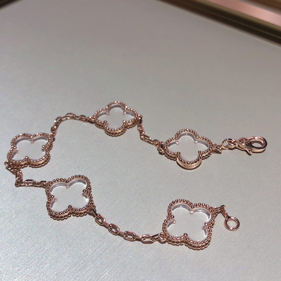 [Bijoux de luxe] Bracelet en or rose avec cristaux de roche et 5 motifs de trèfle