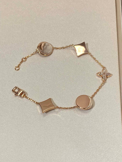 [Luxe Jewelry]STAR AND SUN 5 MOTIF MOP PINK GOLD BRACELET
