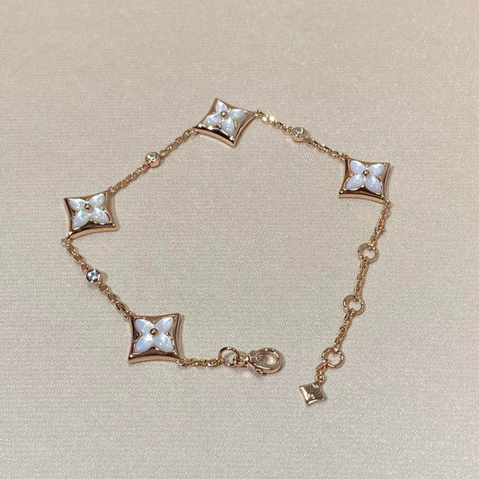 [Bijoux de luxe] Bracelet en or rose avec diamants et nacre à 4 motifs étoiles