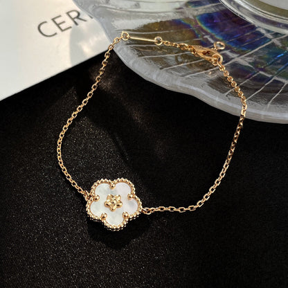 [Bijoux de luxe] Bracelet porte-bonheur en nacre blanche et fleur de prunier