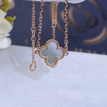 [Bijoux de luxe] Bracelet fleur unique en nacre blanche et trèfle