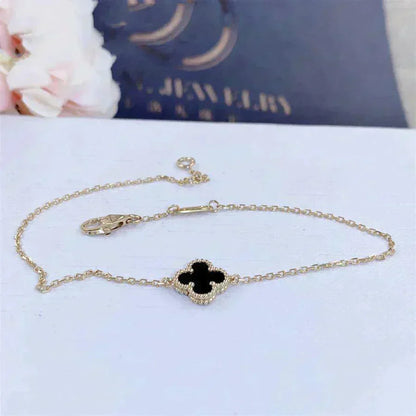 [Bijoux de luxe] Bracelet fleur unique en onyx et trèfle